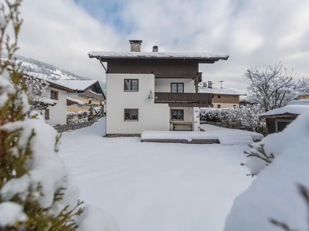 Quaint Chalet in Kirchberg with Terrace, Garden, Ski Storage
