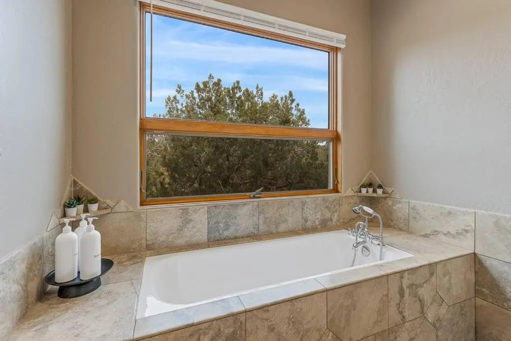 Close to Fresh Creek! Sleeps 12 ~ Amazing Views w/Serene Open Space ~ Hot Tub + Game Room ~ Trails outside