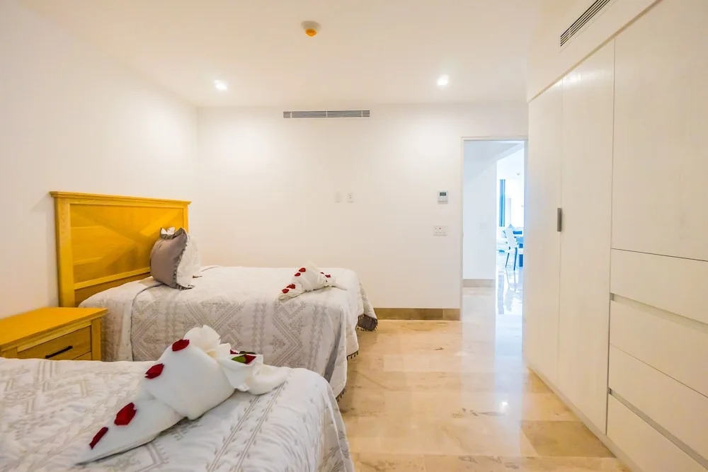 Contemporary Design Oceana 422 Playa del Carmen Condo by RedAwning