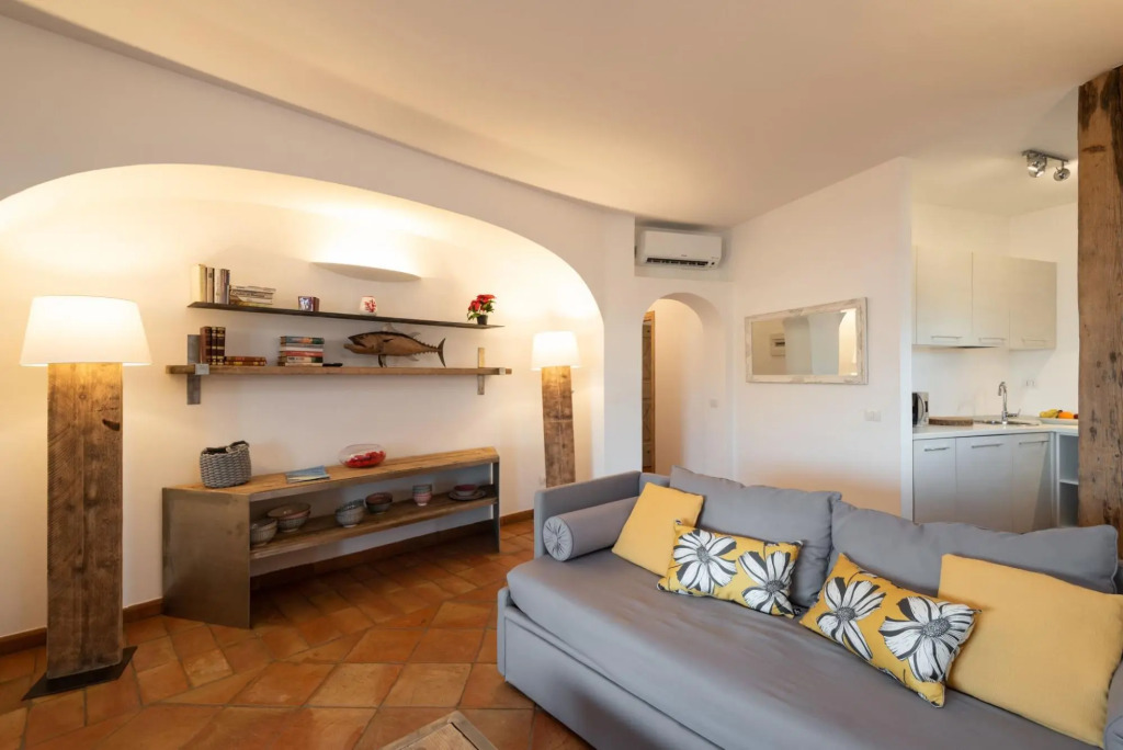 The property includes a double bedroom, a bathroom with a shower, large living room with sofa-bed (f-FIGAROLO1_PP
