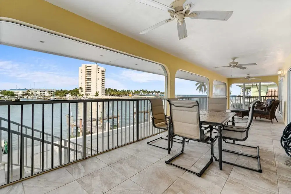 Sunset Harbor Waterfront Villa with Dock Cabana Club