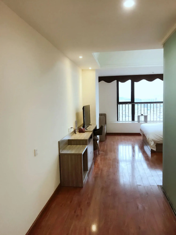Xingyue Apartment Luogang Wanda