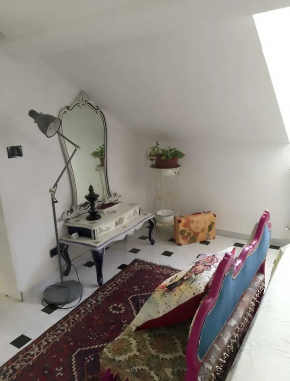 Spacious and Naturally Bright Bomboniera Rooftop Favors Apartment