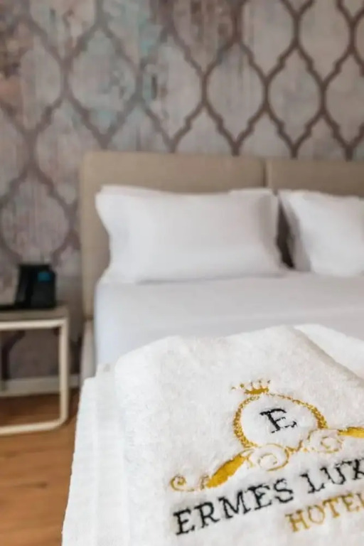 Ermes Deluxe Triple Room