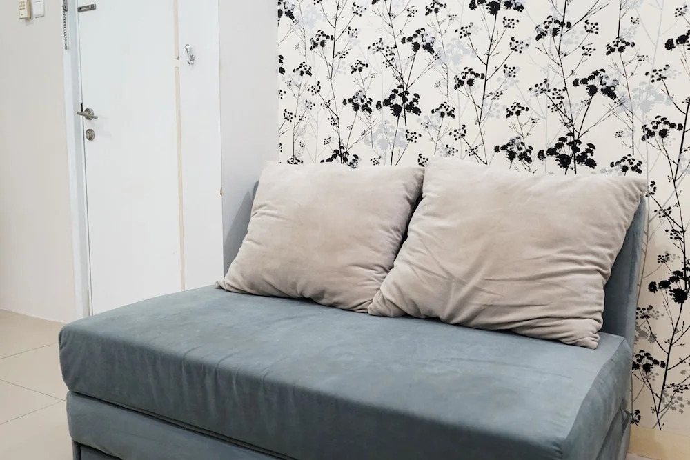 Homey 1BR with City View at Green Pramuka Apartment By Travelio