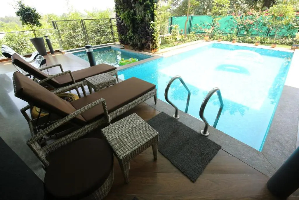 Villa 41 by StayVista - A chic retreat with a pool, poker table, and a theater room