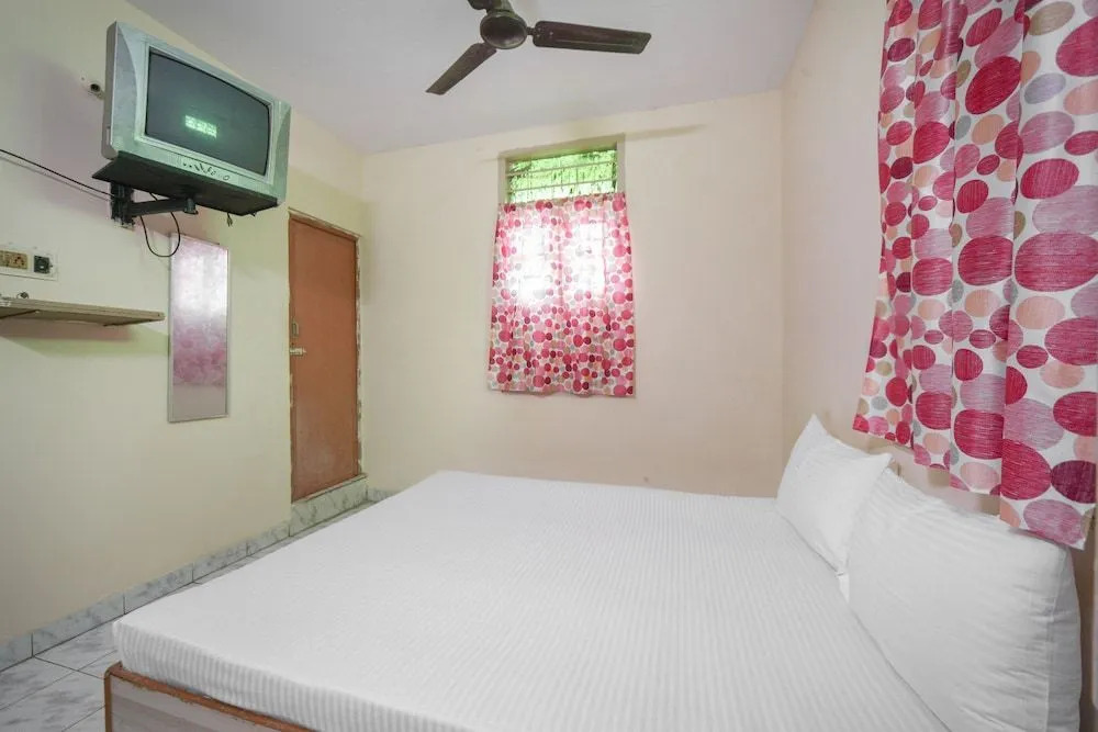 Spot On 60491 Harini Lodge