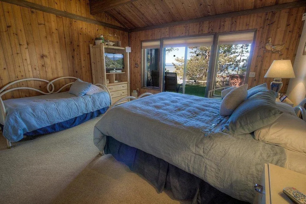 Large Lakefront Home with Hot Tub Sleeps 14 by RedAwning