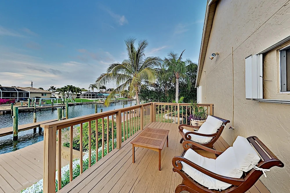 Canal-front W/ Boat Dock & Screened Pool 4 Bedroom Home