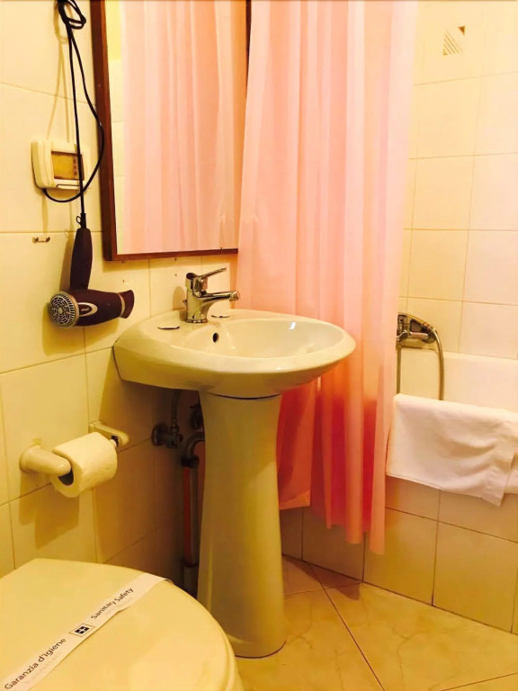 Corato room economy