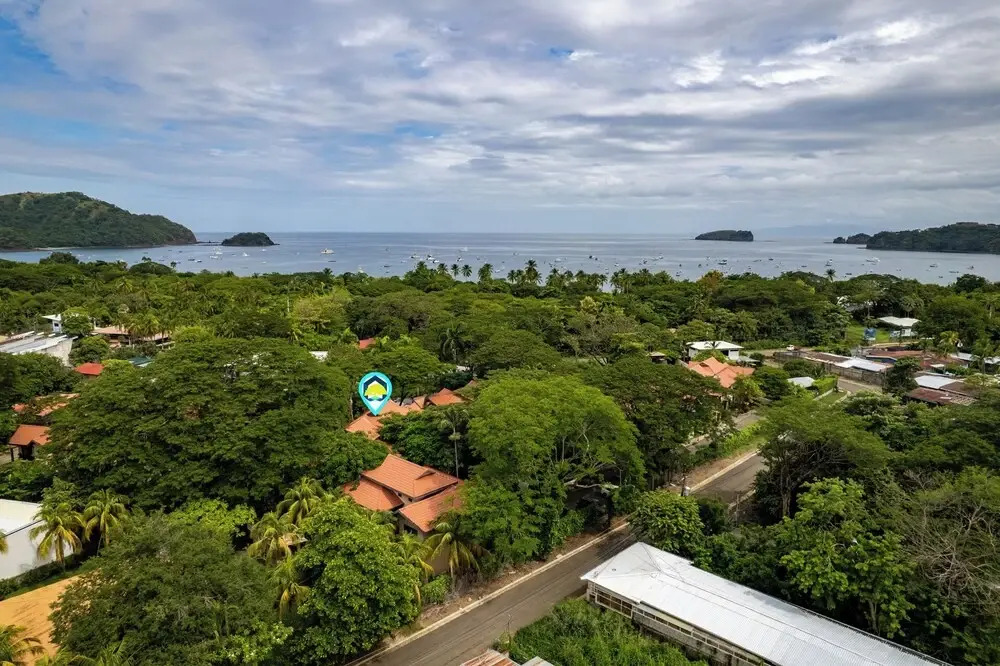 Modern Island-Themed Condo with Floor-to-Ceiling Windows & Garden and Pool Views Within Walking Distance of the Beach