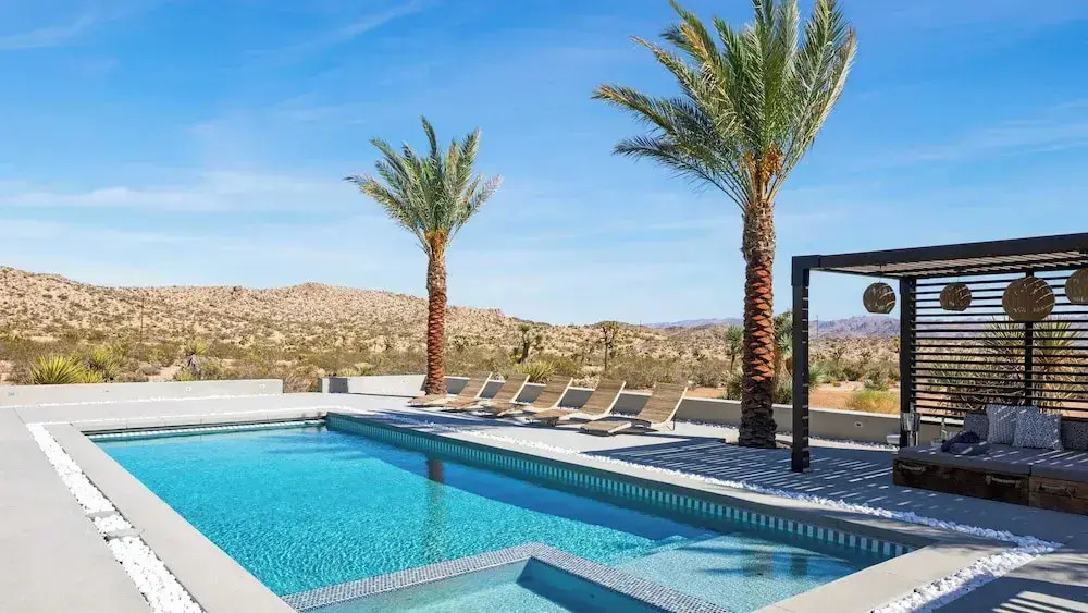 Iconic 6BR Desert Retreat w/ Pool, Pickleball & Fire Pit Joshua Tree Mansion by Avantstay