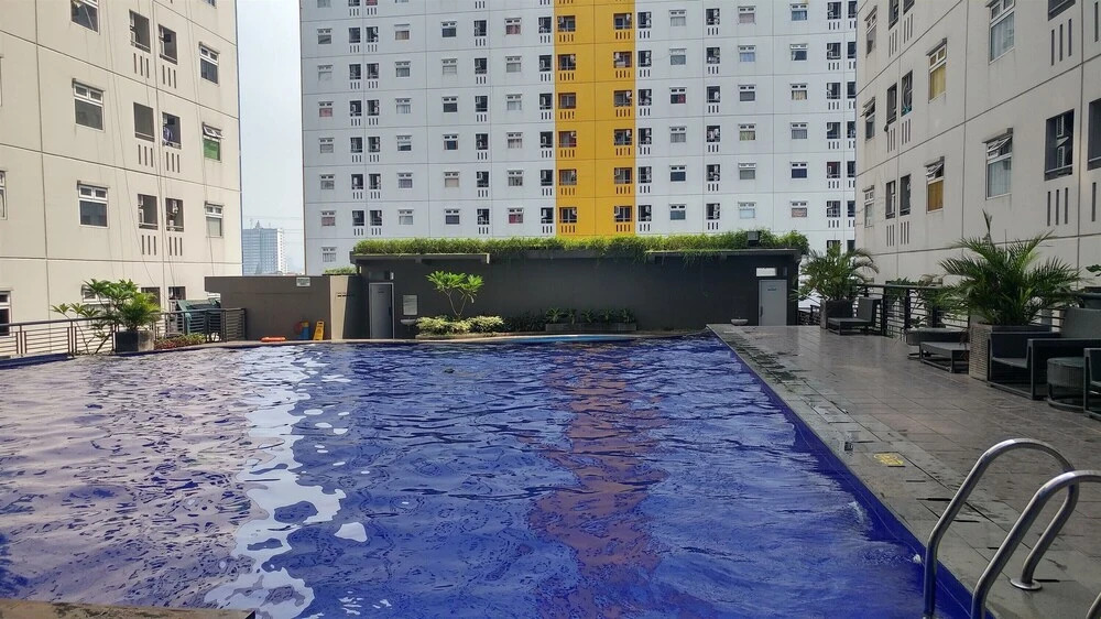 Furnished Green Pramuka 1BR Apartment with Modern Style and City View