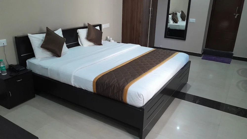 the Nisarga Grand   boarding & lodging