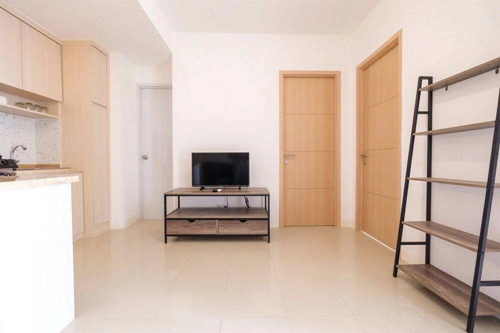 Spacious 2 Bedroom at Bassura City Apartment By Travelio