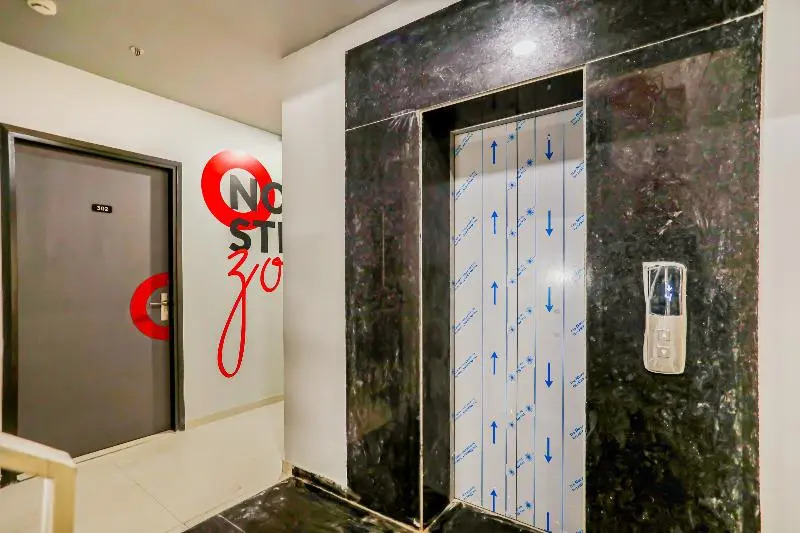 Collection O 45795  Le Noida Hotel, Near Sector 76 Metro Station.