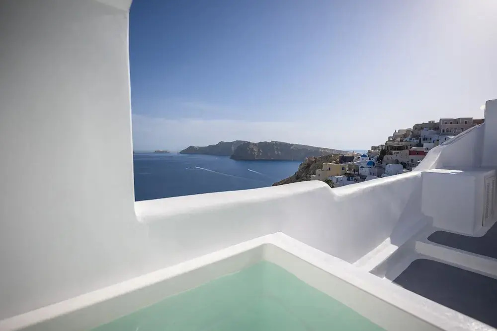 Three Domes Oia - an Iconic Collection