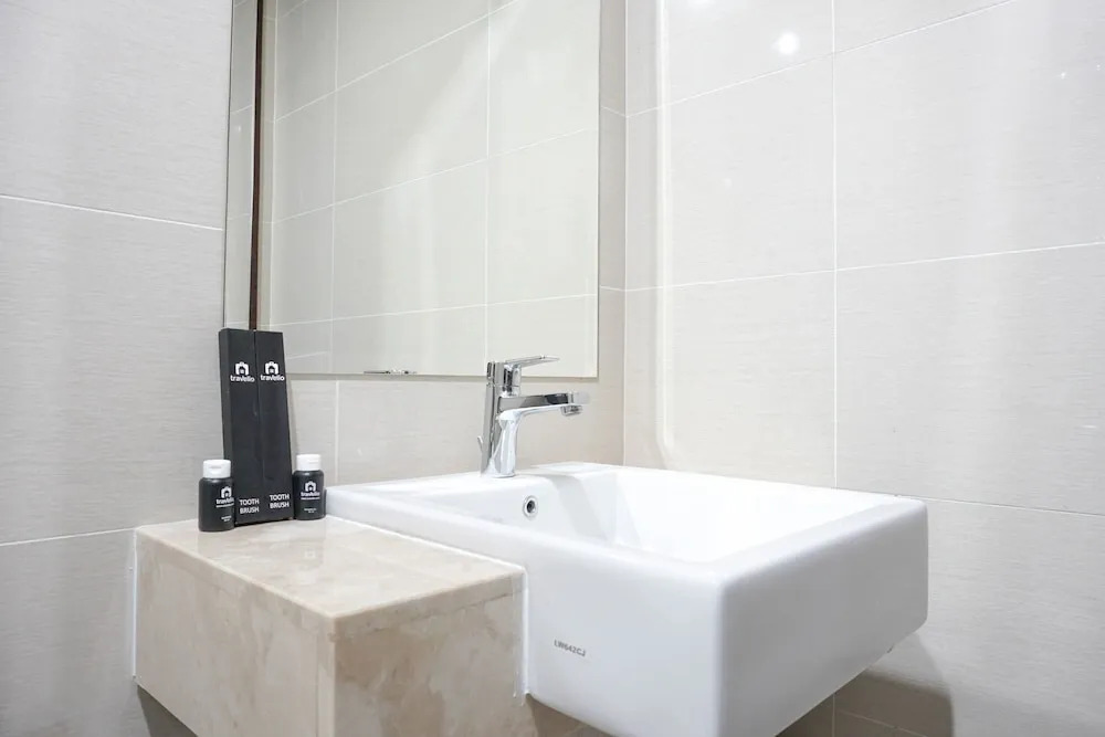 Minimalist 3BR Apartment at Puri Mansion