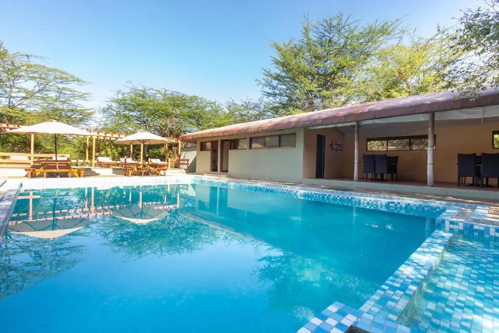 Отель PrideInn Mara Camp & Cottages