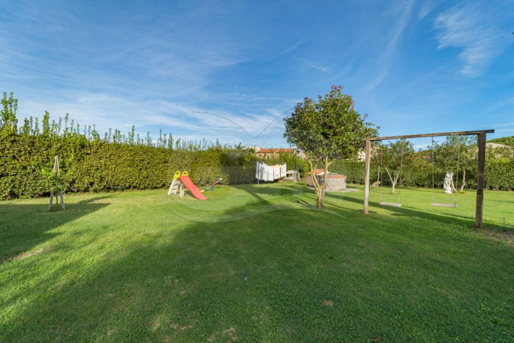 Albero del Pepe 2 with lush garden-ALBERO DEL PEPE 2