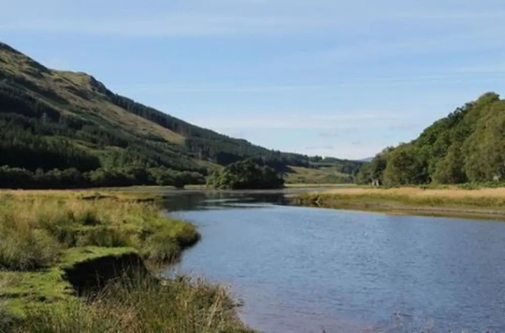 Osprey Lodge with river and mountain view