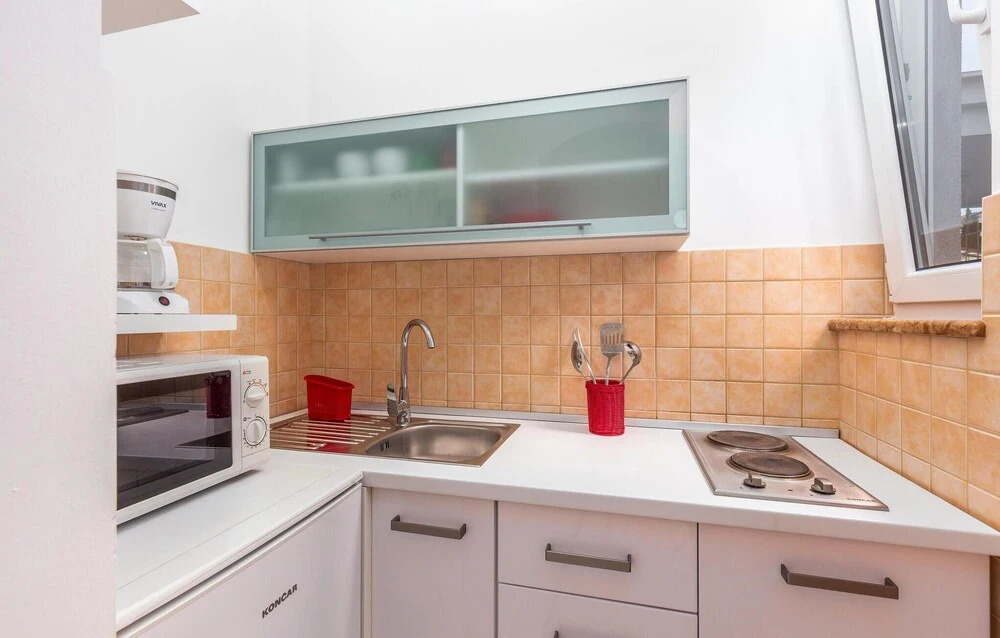 Nice Home in Njivice with Hot Tub, WiFi & 1 Bedrooms