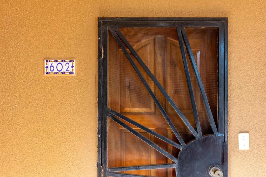 Beachfront Condo with Warm, Rustic Interiors & Direct Access to Playa Flamingo