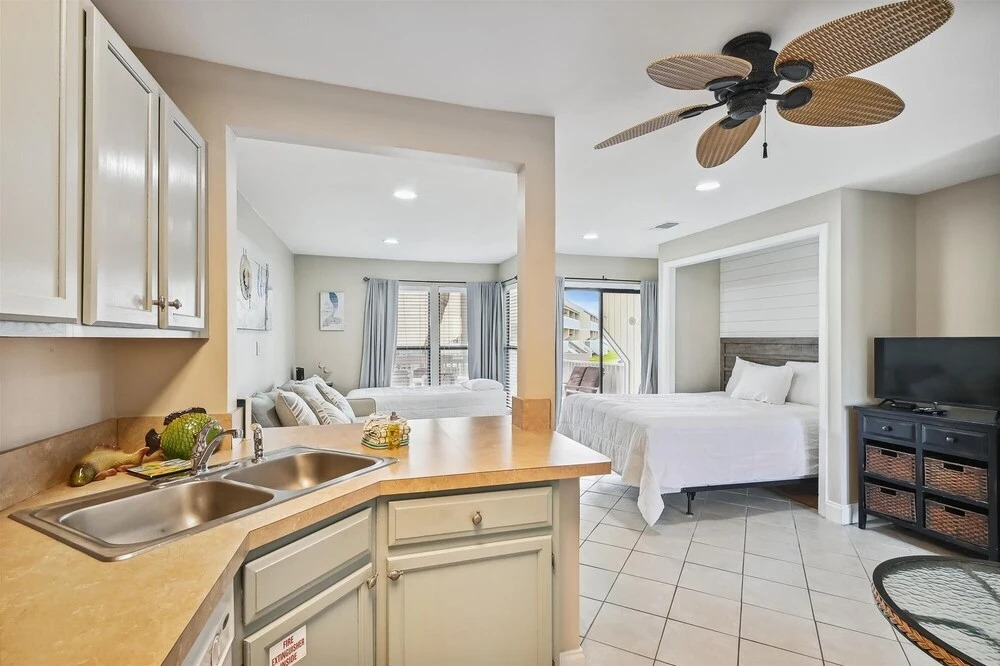 Studio With A Queen Size Bed, Twin Bed And Sofa Sleeper - Sleeps 5 0 Bedroom Condo by RedAwning