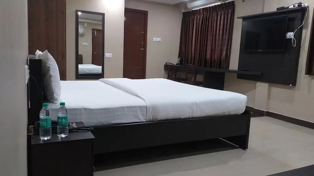 the Nisarga Grand   boarding & lodging