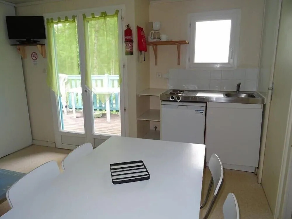 Camping le Repaire - Les Chalets