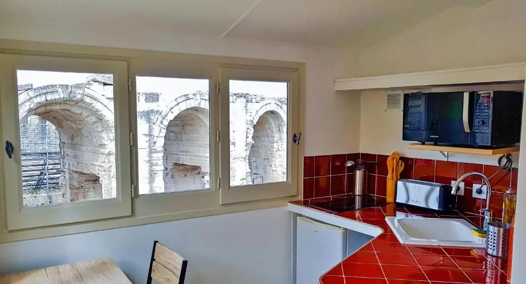 Studio avec terrasse sur l'Amphithéâtre (arènes)