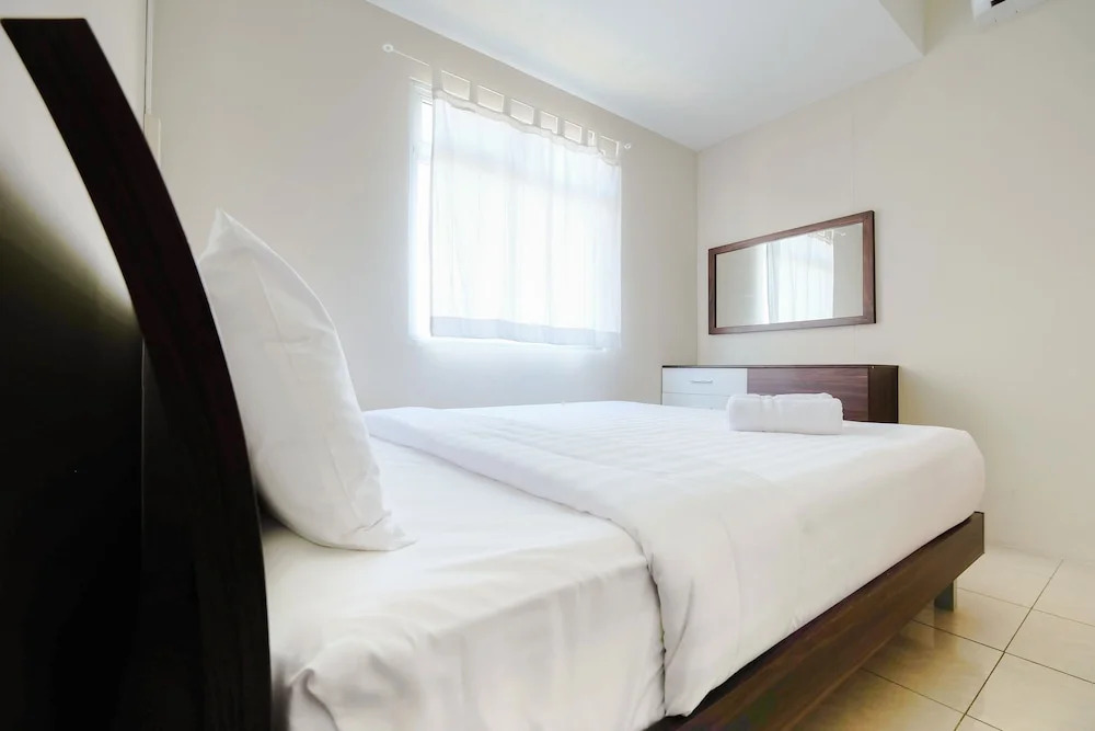 2 Bedrooms at Gading Greenhill Apartment by Travelio