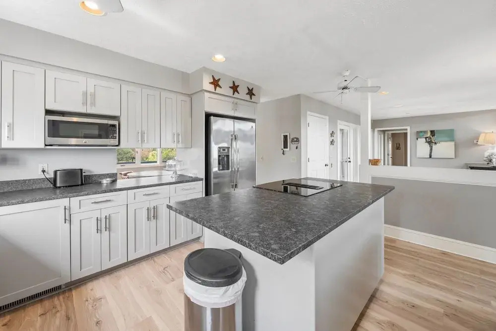 Take Your Shoes Off Relax And Put Your Feet In The Sand. 7 Bedroom Home by Peace Vacations