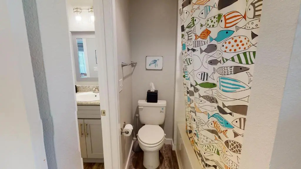 AH-E117 Remodeled First Floor Condo, Across From The Shared Pool & Hot Tub, Near Marina & Ferry