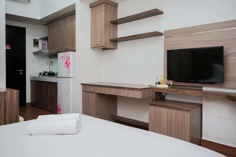 Comfort And High Floor Studio Room At Casa De Parco Apartment