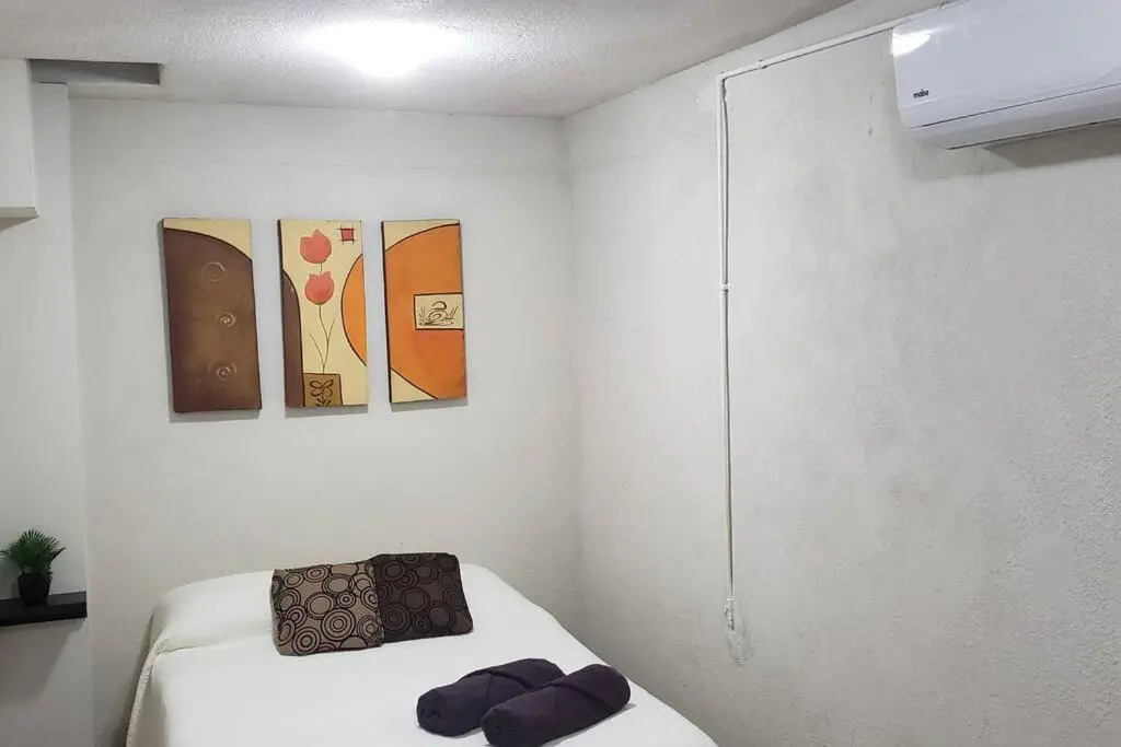 Suite con 2 recamaras,2mini splits, Parking Wifi 100 mb, cocina