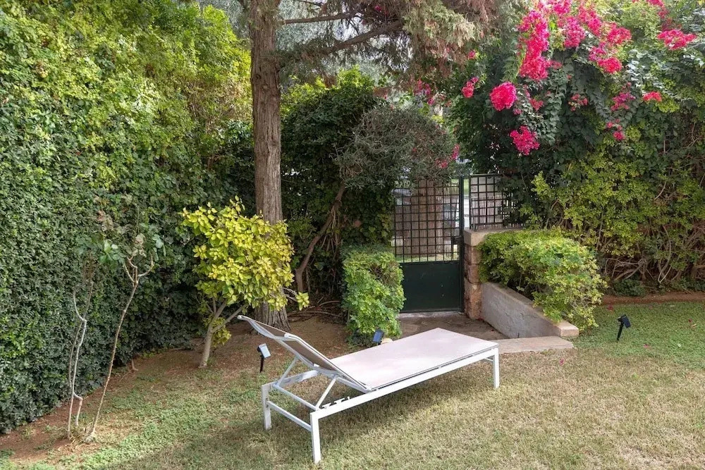 Private Garden Duplex in Voula by GHH