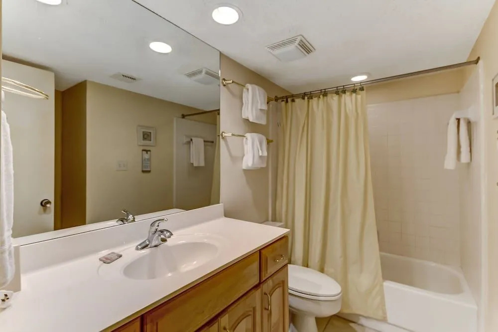 Dog Friendly Beach Wood Condo, Minutes Away from Atlantic Ocean by RedAwning