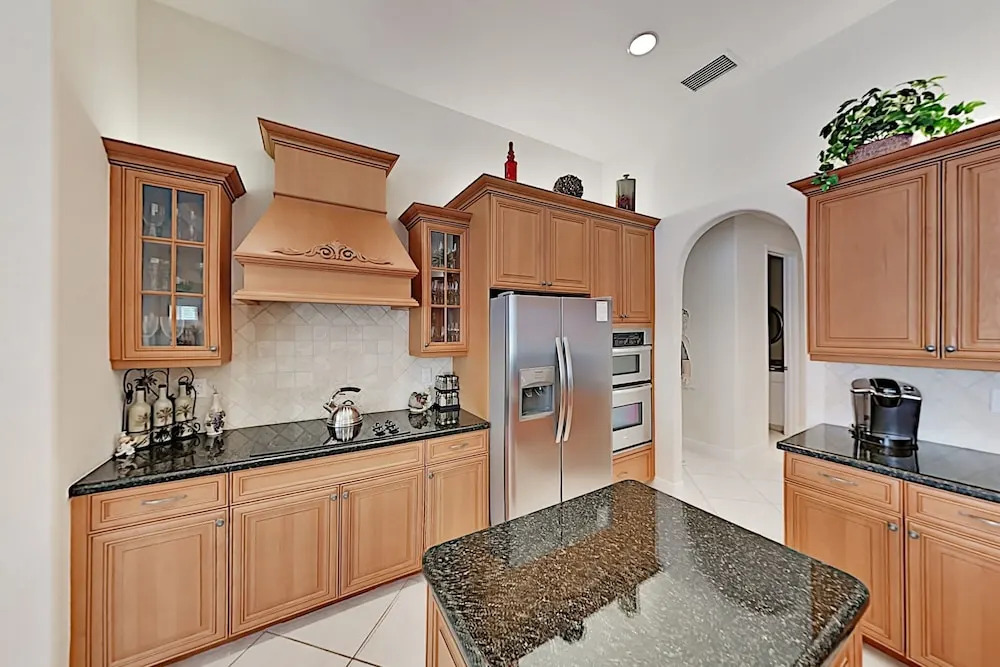 Upscale All-suite Canal W/ Dock & Fireplace 4 Bedroom Home