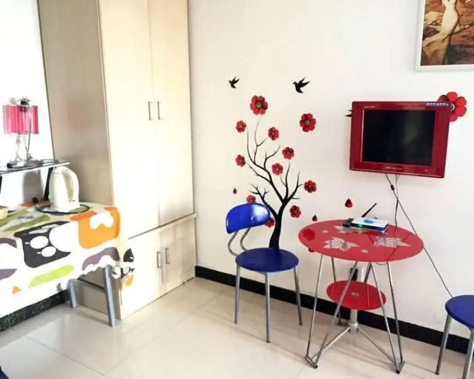 Yixin Apartment Hotel
