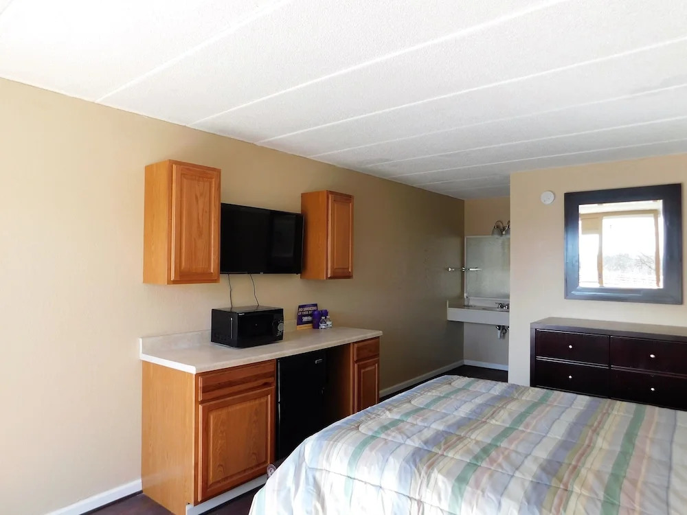 APM Inn and Suites