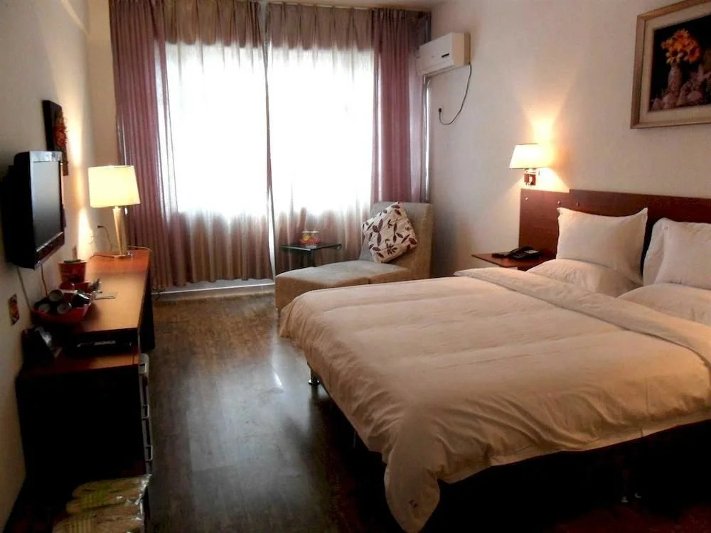 Sansheng Business Hotel