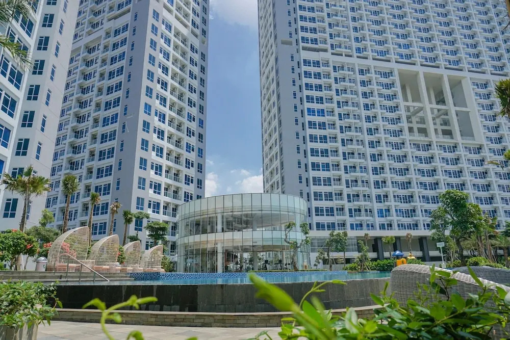 Modern with City View @ Studio Puri Mansion Apartment By Travelio