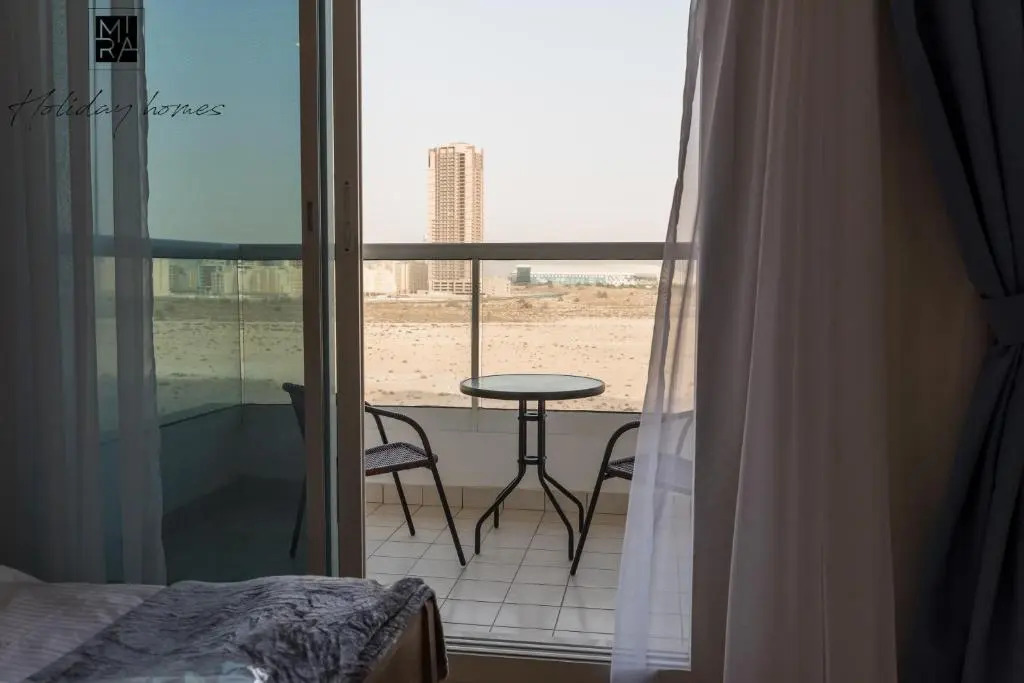 Mira Holiday Homes - Beautiful Studio - WIFI&Pool -7 min to Global Village