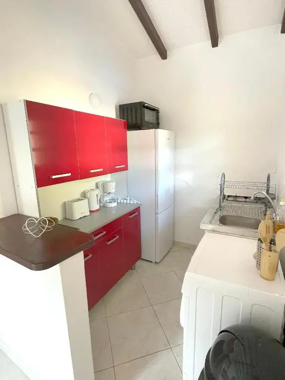 Appartement d'une chambre avec piscine partagee jardin clos et wifi a Le Gosier a 8 km de la plage