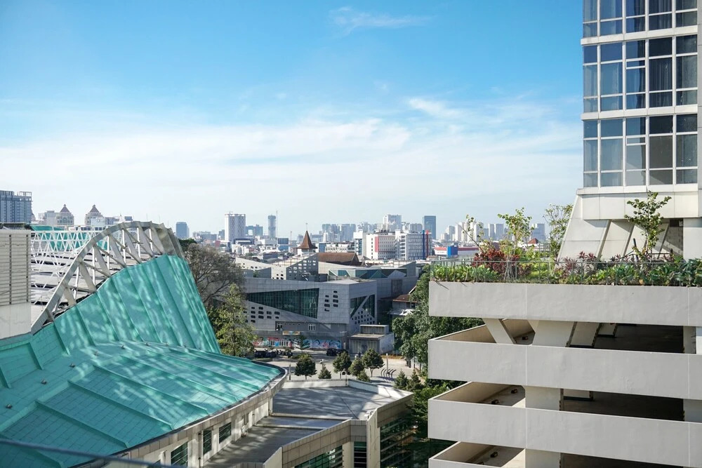Fully Furnished with Cozy Design Studio at Menteng Park Apartment By Travelio
