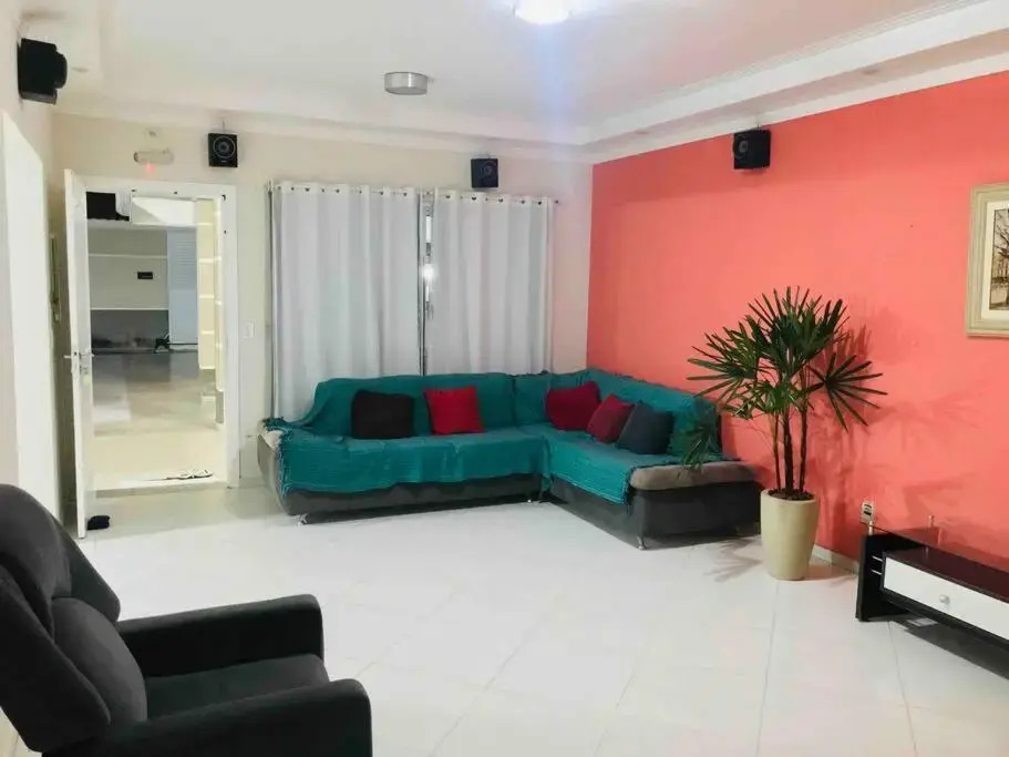 Casa de praia com piscina e churrasqueira - Indaiá Bertioga