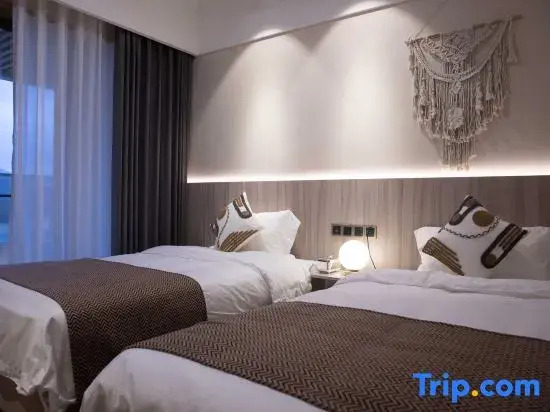 Molam Homestay (Wanning Riyue Bay)