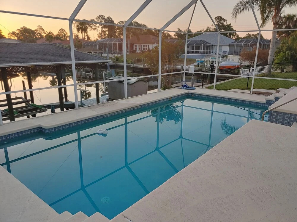 Peaceful Waterfront Pool Home 3 Bedroom Home by RedAwning