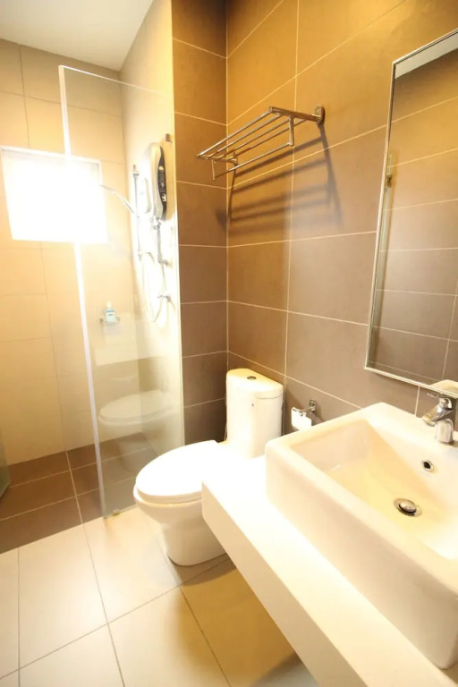 Sentrio Suites @ City Center by HnHCozy